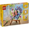 LEGO Creator 3-in-1 Floral Art Painting -rakennussarjan pakkaus, jossa näkyy palikoista rakennettu perhonen ja kukkia maalaustelineellä sekä maalipaletti ja sivellin.