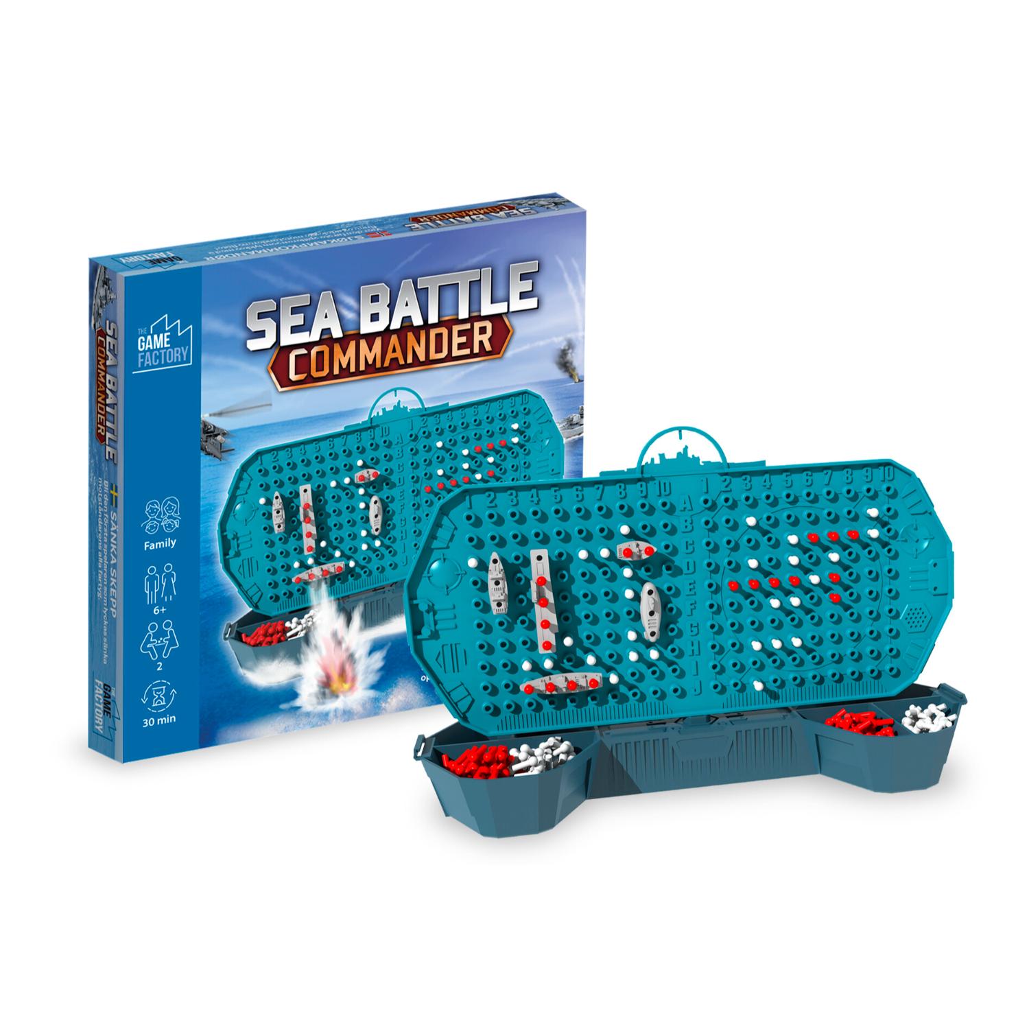 Blue Sea Battle Commander -lautapeli on asetettu pelilaatikon eteen, jossa on aluksia ja vettä esittävä kuvitus. Pelissä on punaisia ja valkoisia pelinappuloita. Peli on avattu ja valmis pelattavaksi.