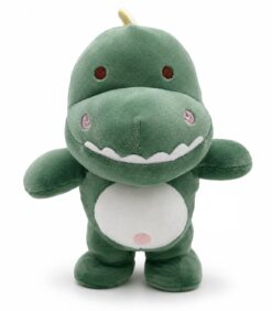 Vihreä pehmolelu, joka esittää dinosauruslelua, jolla on valkoinen vatsa, pieni sarvi päässä ja leveä, ystävällinen hymy.